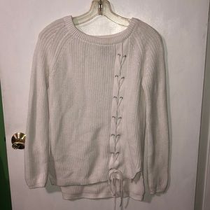 white knitted sweater with design